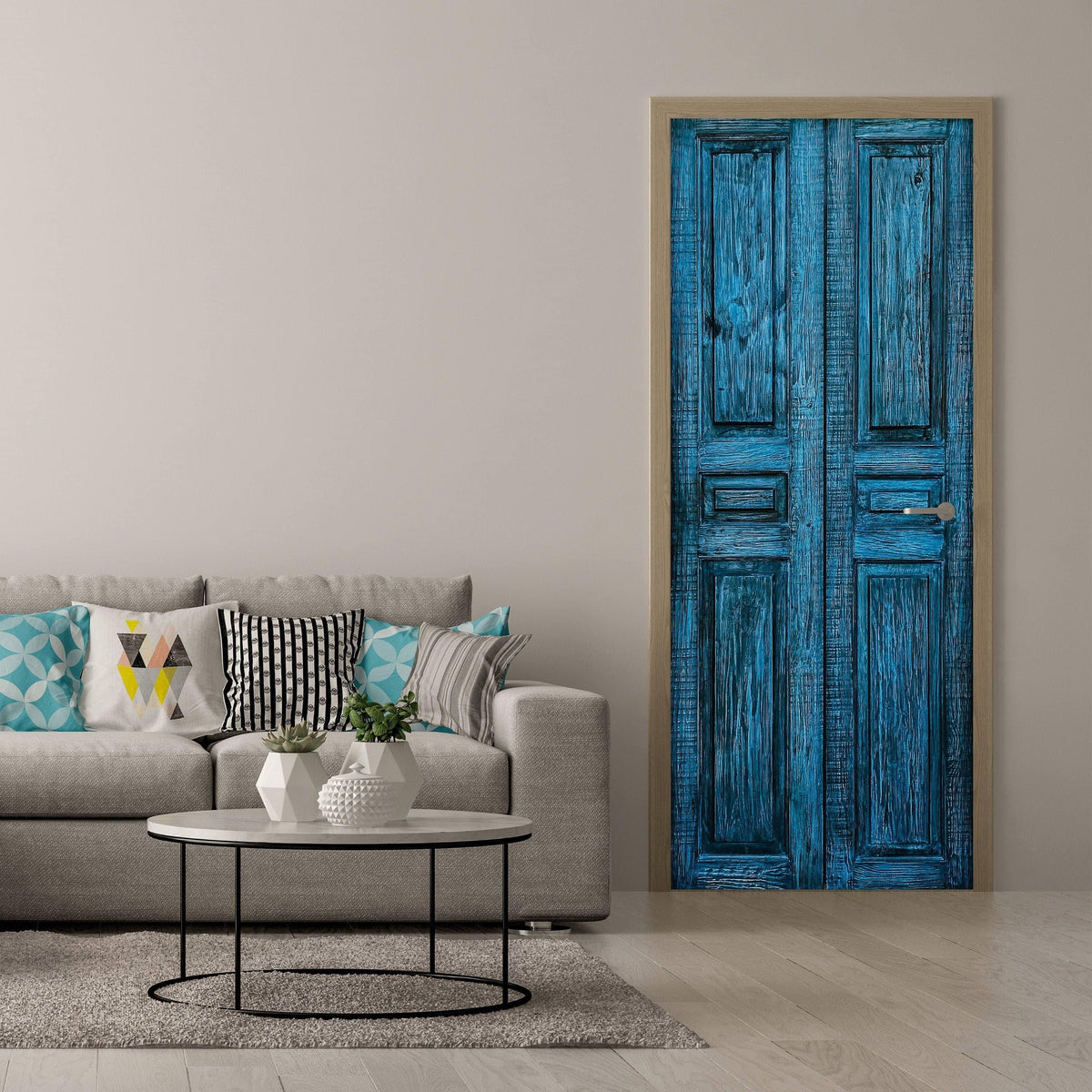 3D vibrant blue barn door wallpaper mural in a modern living room with cozy couch and decorative pillows.
