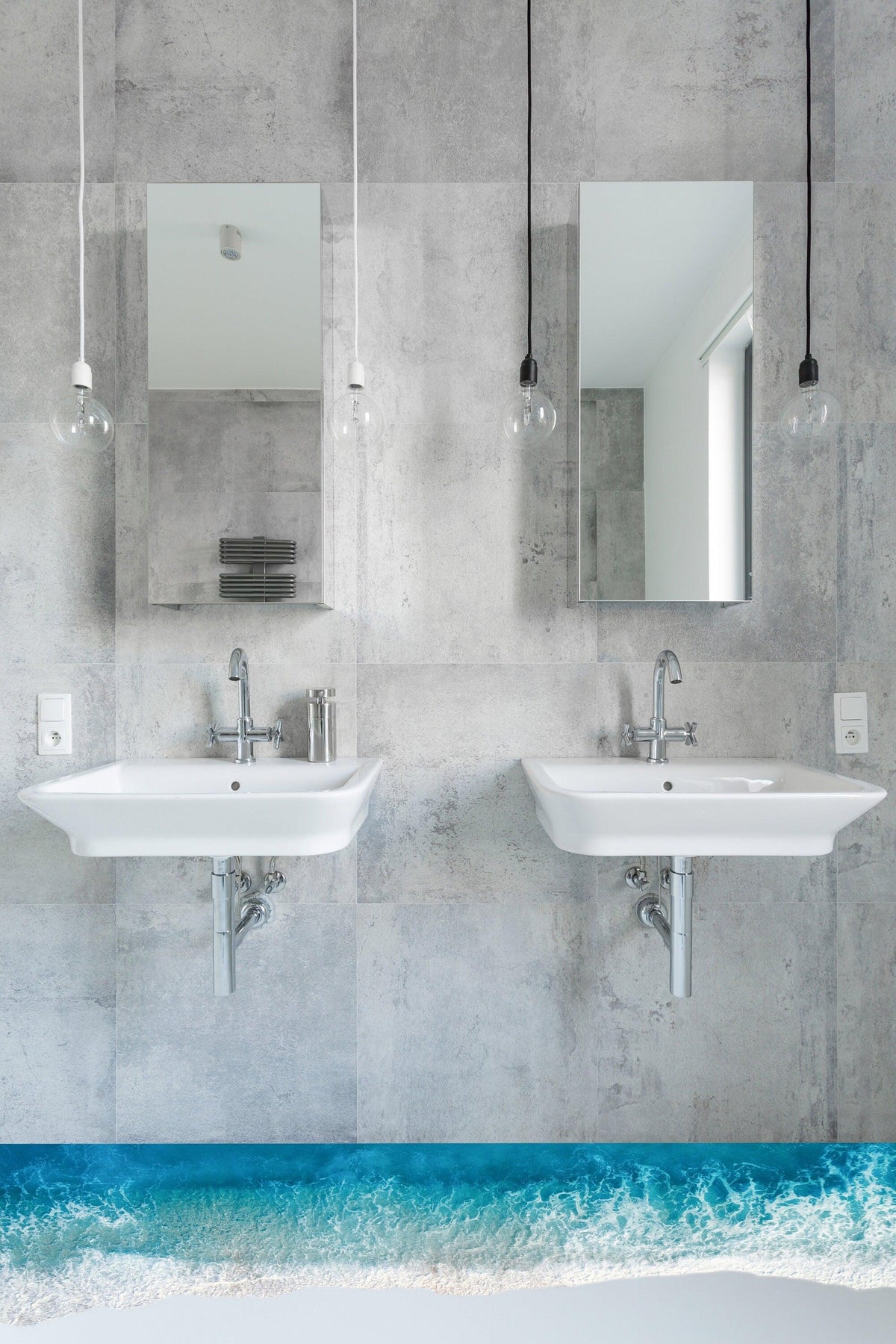 Modern bathroom with two sinks and mirrors featuring a 3D ocean beach floor decal for a tranquil atmosphere.
