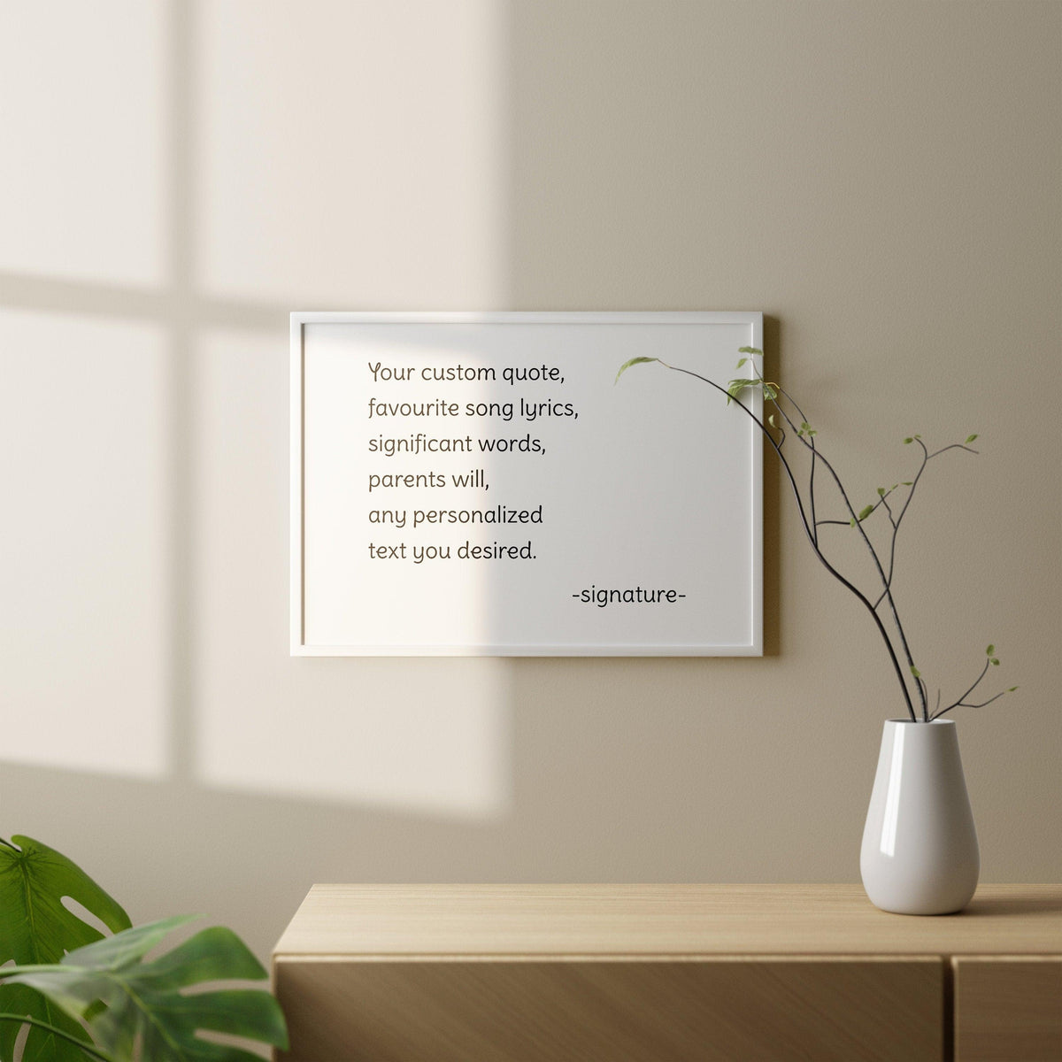 Customized motivational art print with personalized quote on a wall, framed and displayed on a wooden table.