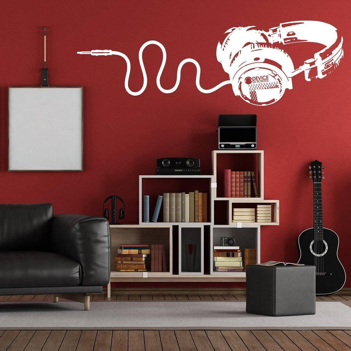 Decorative vinyl wall decal of headphones on a red wall.