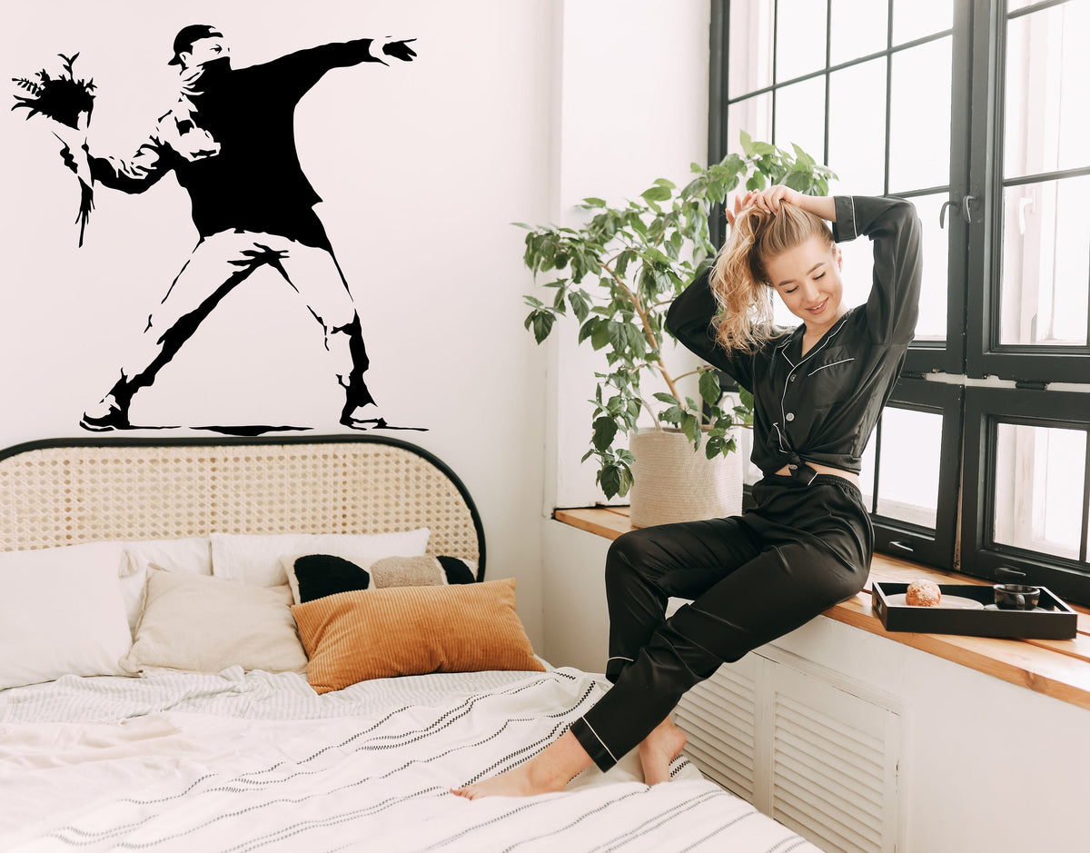 Flower Thrower Street Art Wall Decal featuring the flower throwing figure and bouquet composition shown in the product gallery