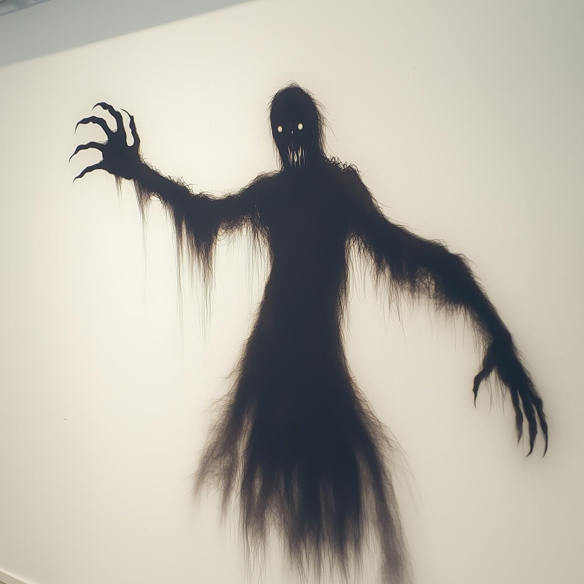 Scary Shadow Wall Sticker featuring a creepy ghostly figure for Halloween decor