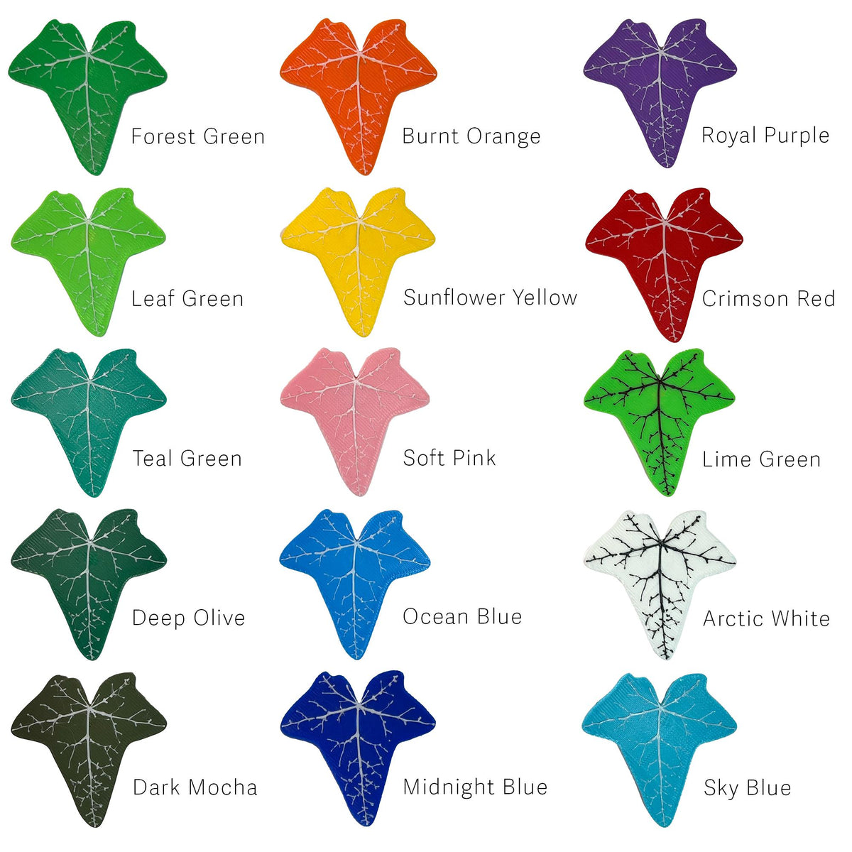 Colorful variety of leaf-shaped plant markers in shades like green, orange, purple, and blue for garden organization.