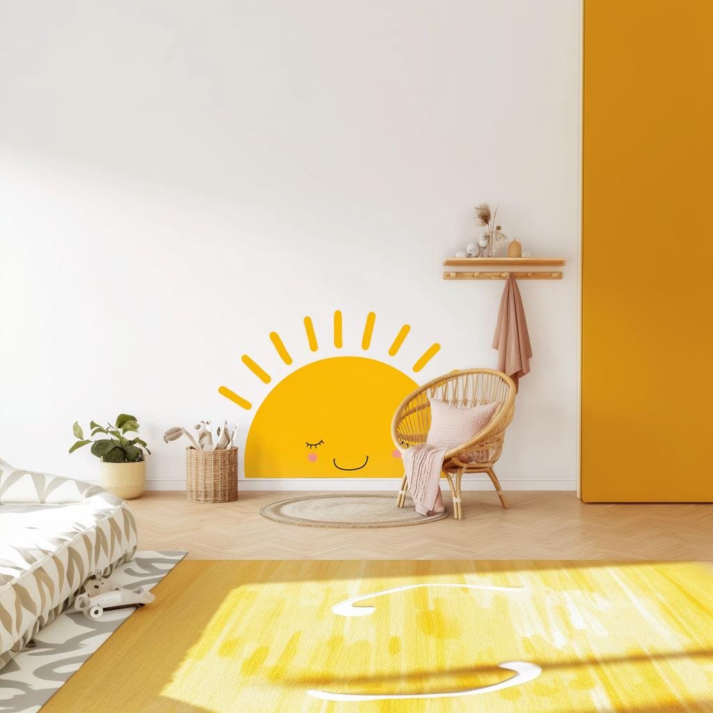 Bright yellow smiling half sun wall decal in a cozy nursery, creating a cheerful atmosphere.