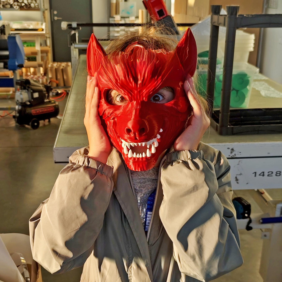 3D printed werewolf cosplay mask with sharp teeth and pointed ears, posing outdoors in a dark outfit