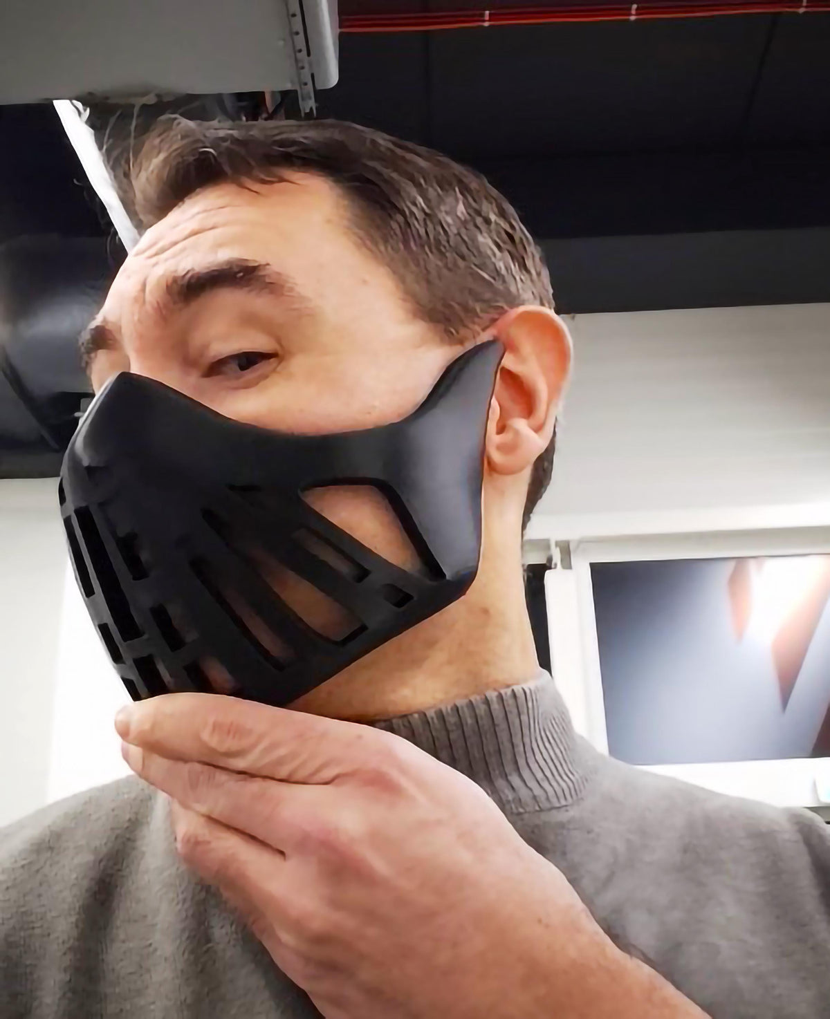 3D printed futuristic warrior face mask with angular cutouts