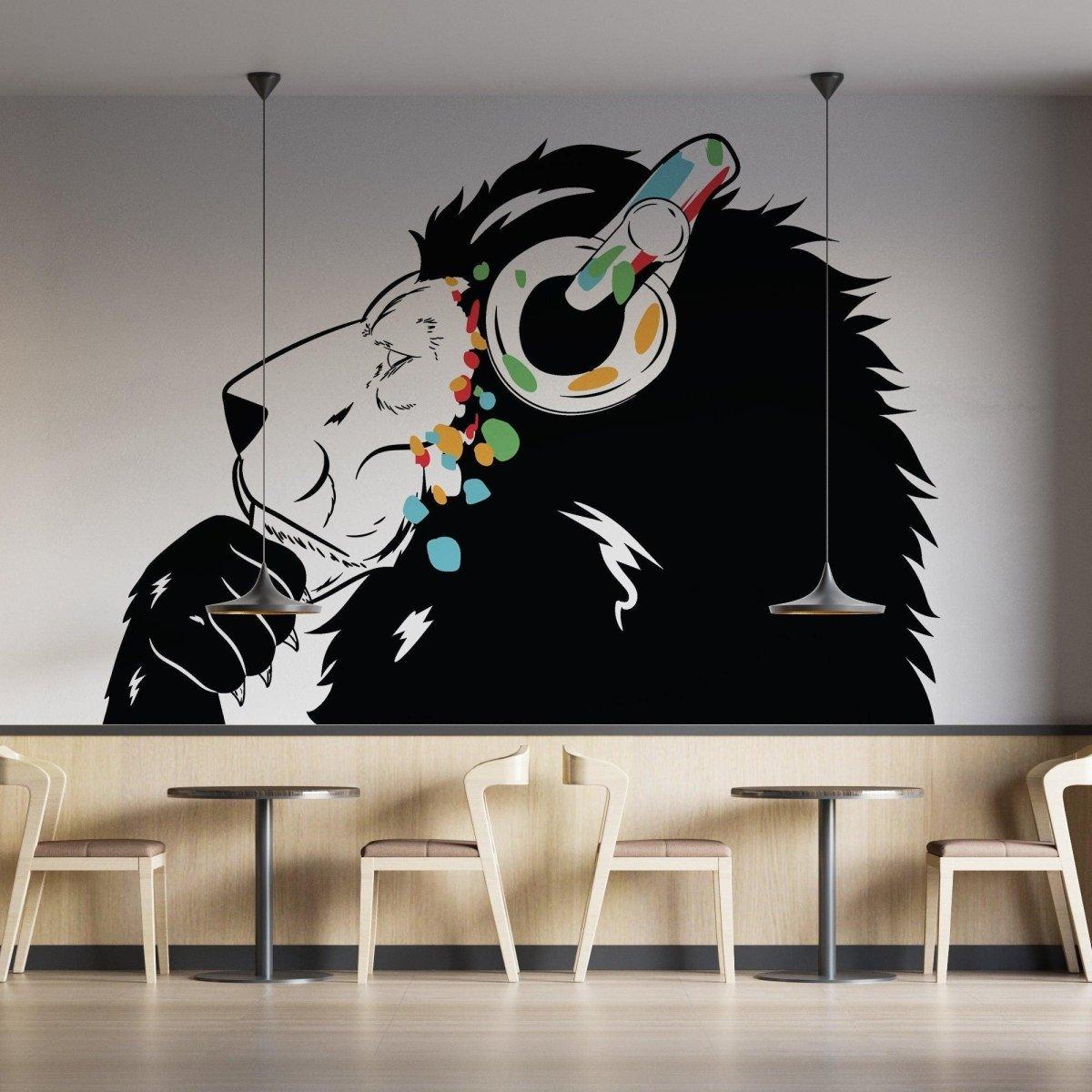 Stylish lion wall sticker with headphones in a modern cafe setting.