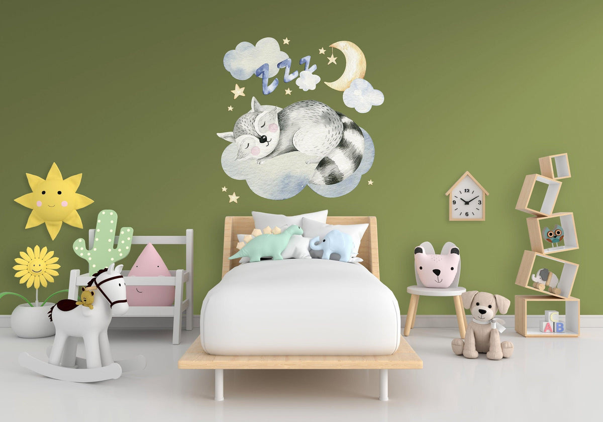 Adorable nursery wall decal featuring a sleeping raccoon on a cloud with stars.