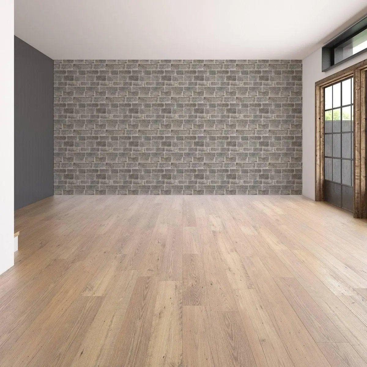 Interior of a modern room featuring a peel-and-stick printed stone-effect vinyl wall mural.