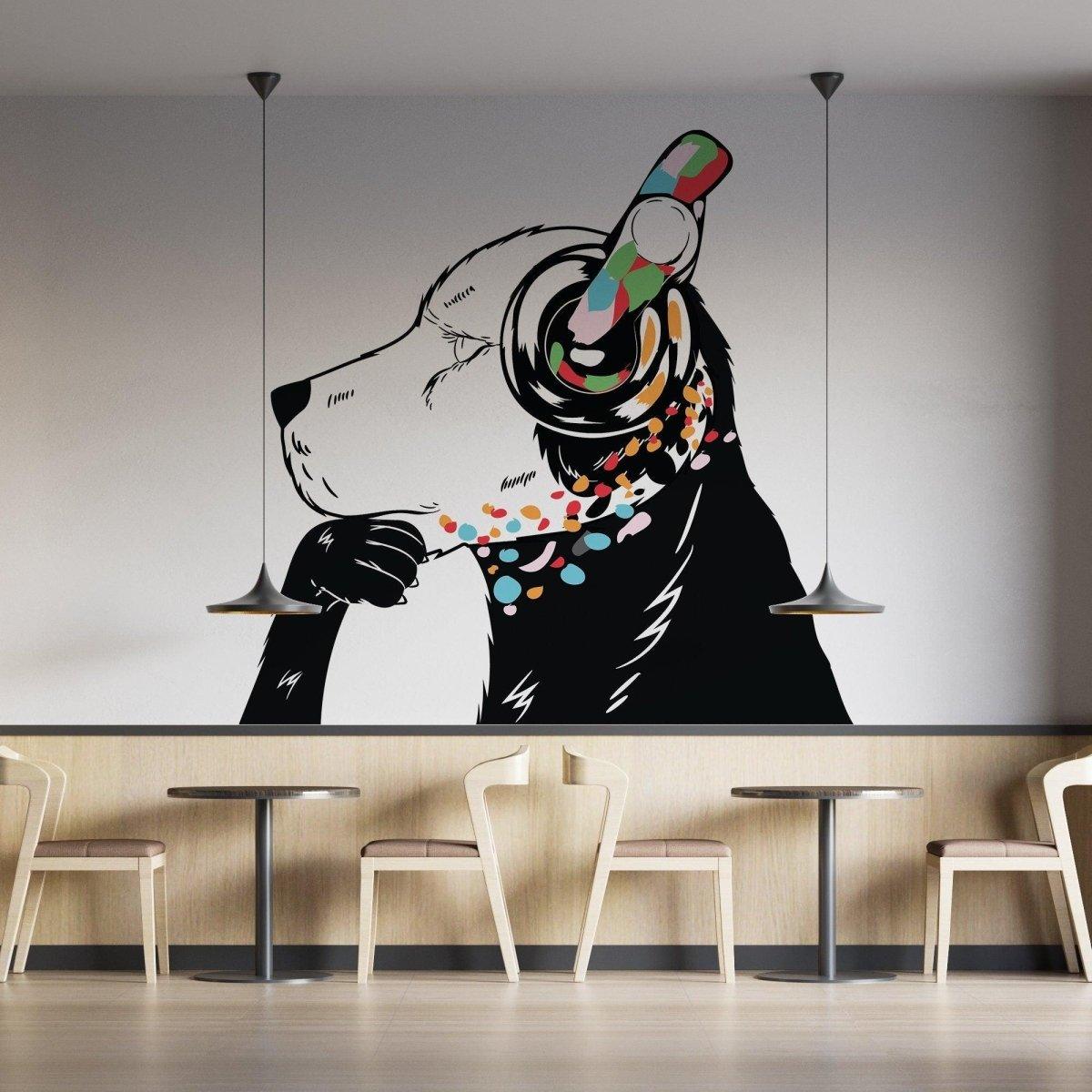 Street art wall decal of a dog wearing headphones.