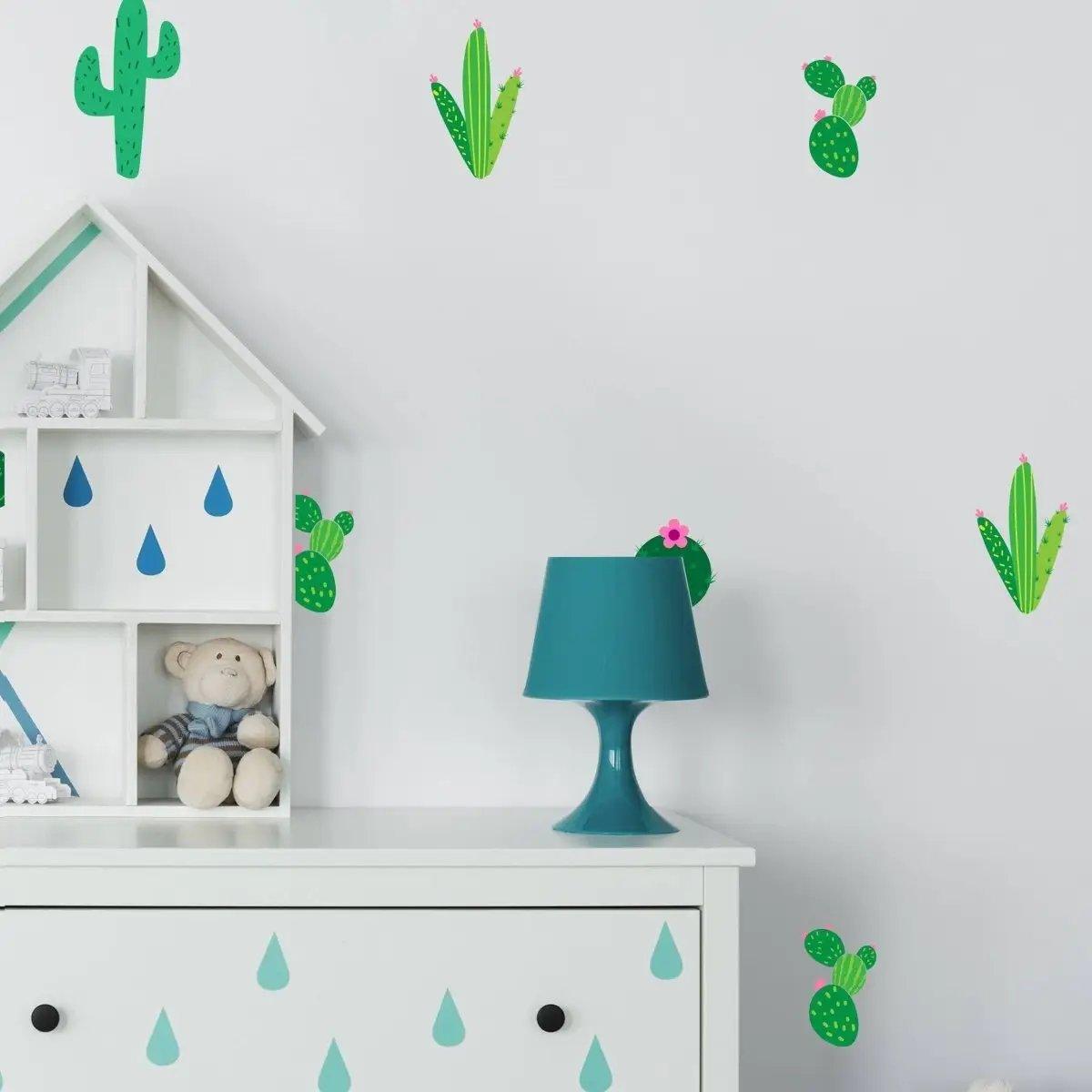 Colorful cactus vinyl wall decals adorning a child's room, enhancing decor with a playful nature theme.