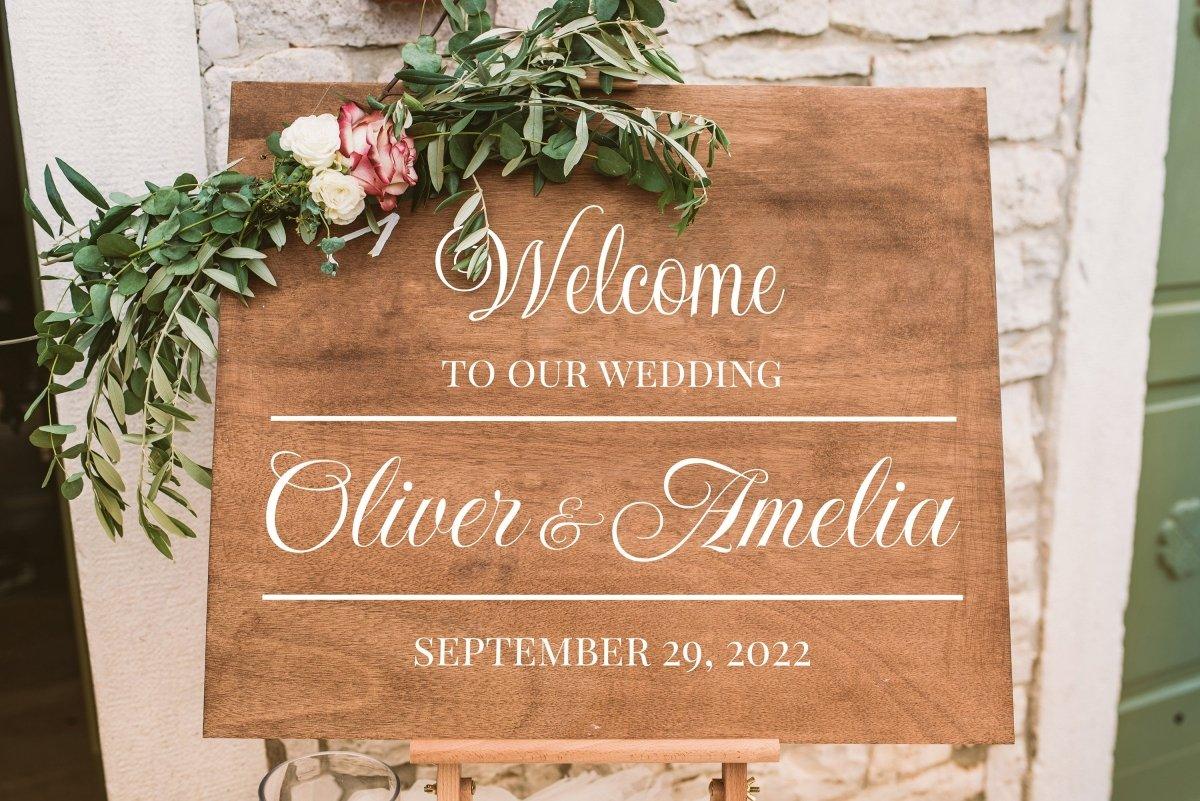 Personalized wedding welcome sign featuring names Oliver & Amelia, date September 29 and 2022.