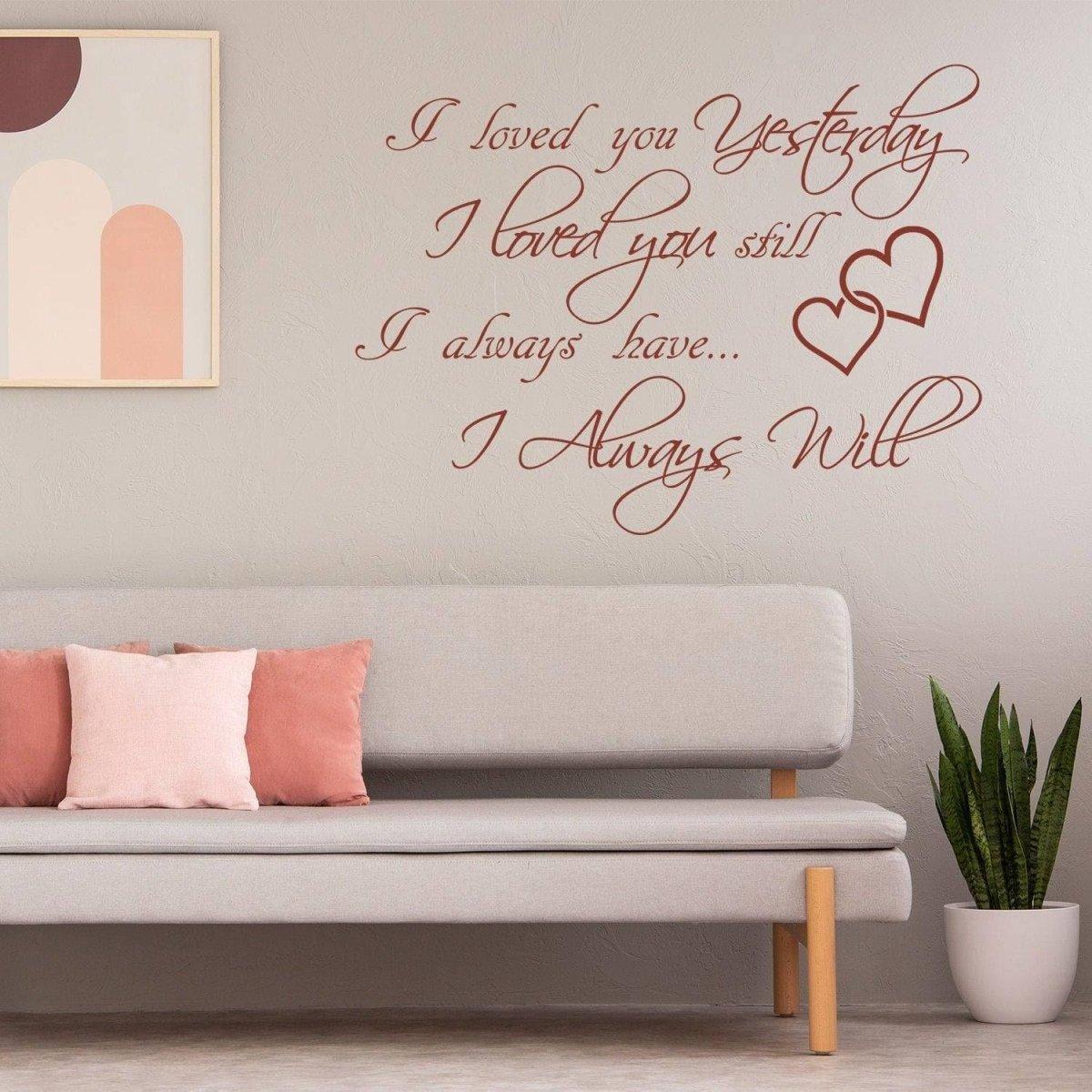 Love Forever wall sticker with romantic quote and hearts displayed above a modern sofa in a cozy living room setting.