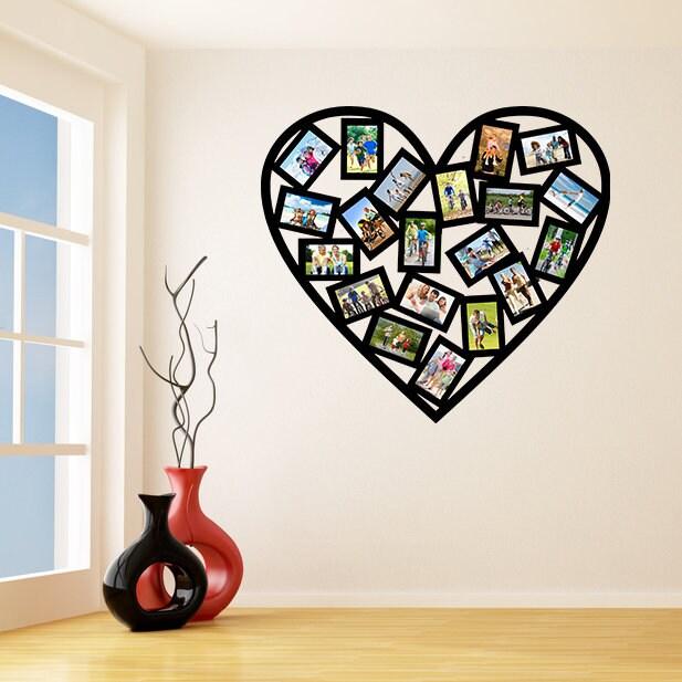 Heart-shaped picture frame wall sticker with multiple photo frames displayed in a stylish room decor.