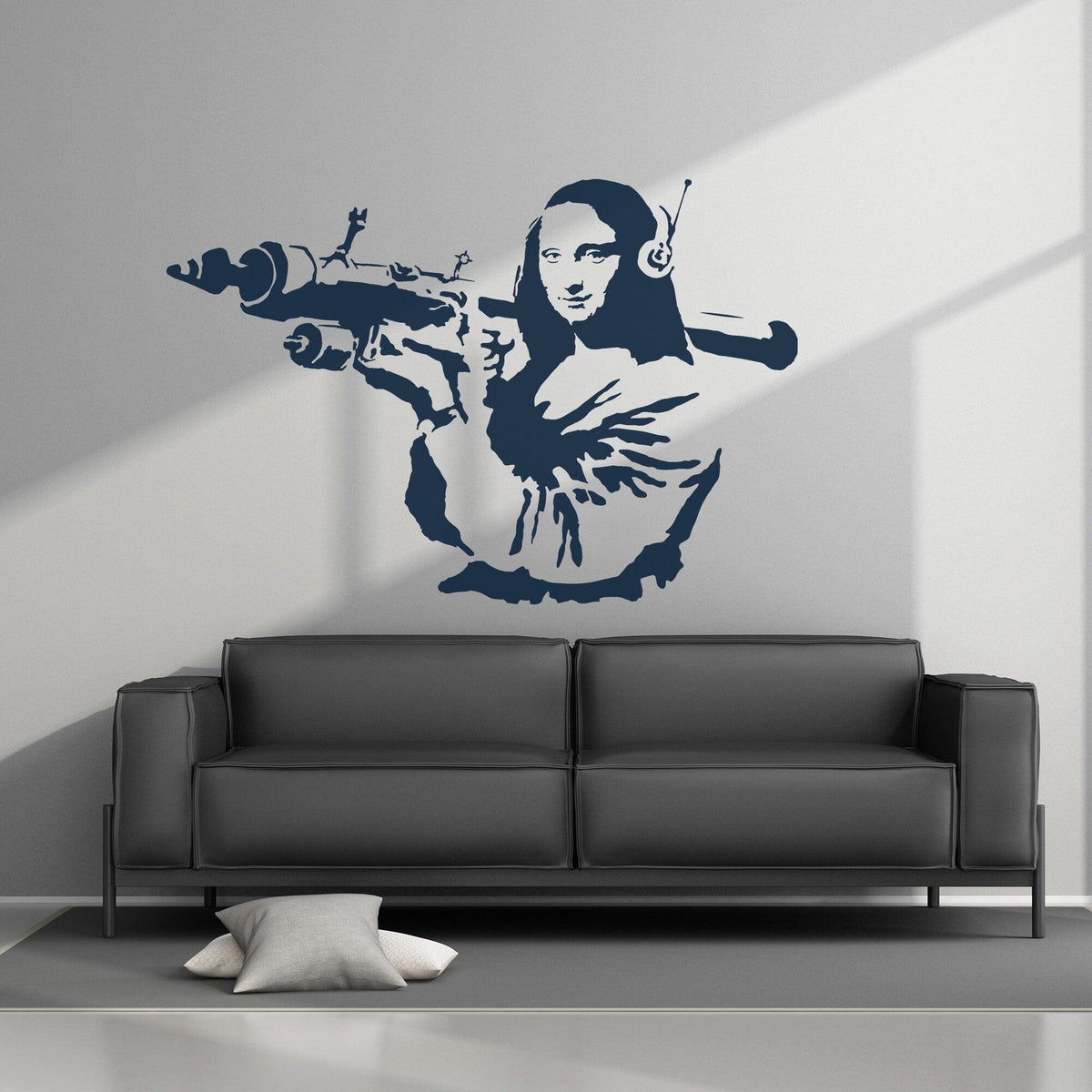 Mona Lisa wall sticker with a modern street art twist above a sofa.