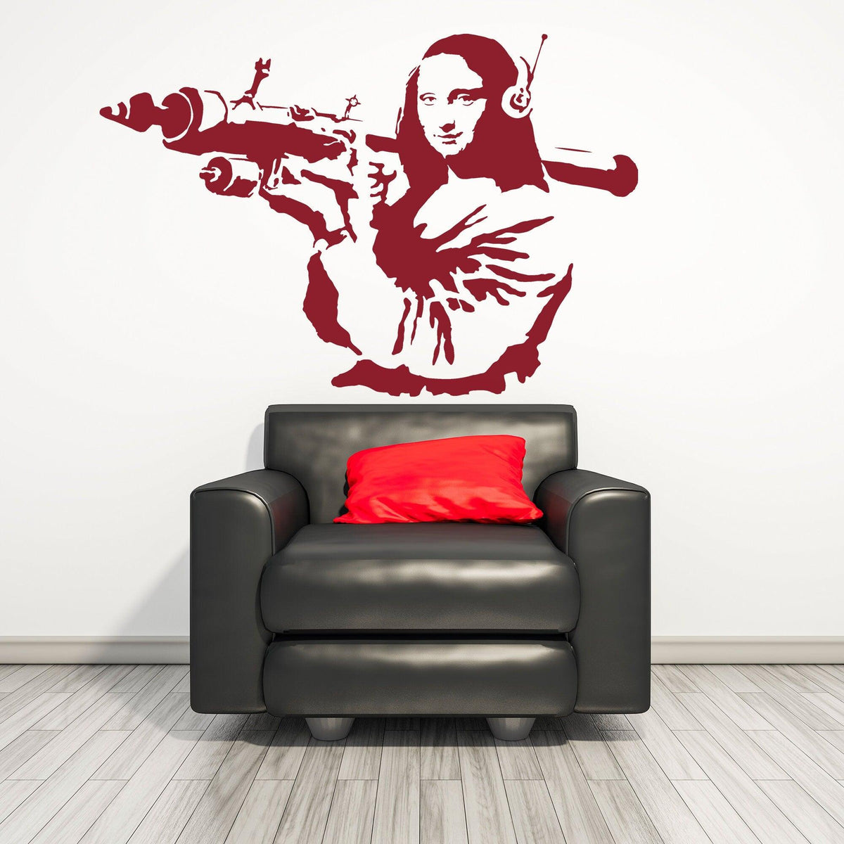 Mona Lisa wall sticker above a black couch.