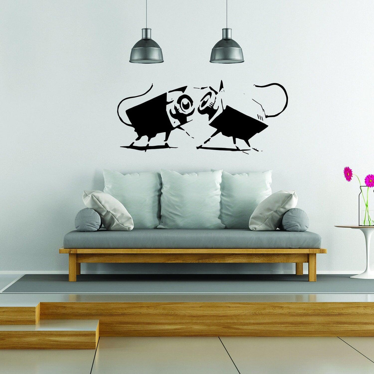 Two playful cartoon mice decal on a wall above a modern sofa in a stylish living room.