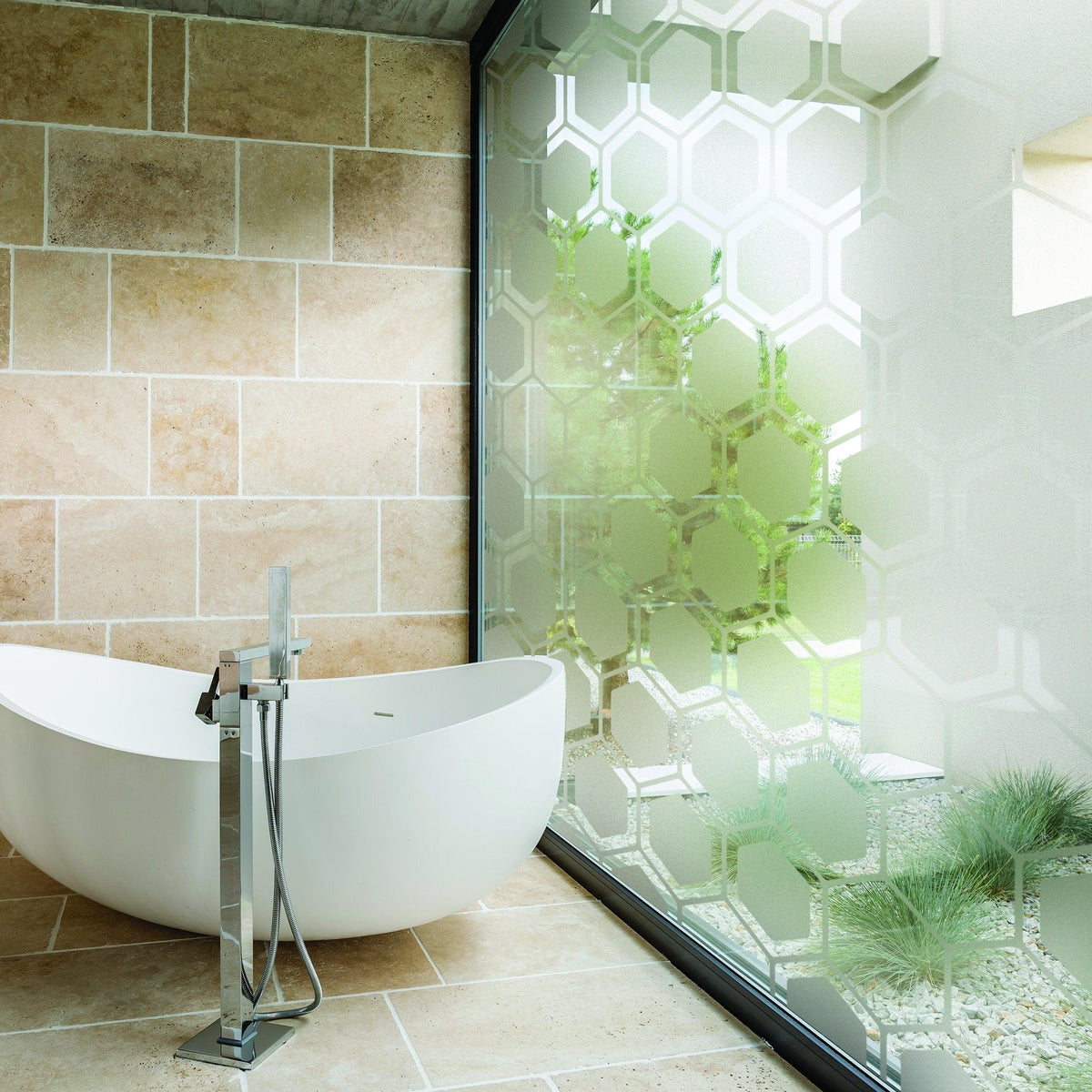 Frosted window film vinyl decal in modern bathroom, providing privacy with an elegant hexagon design.