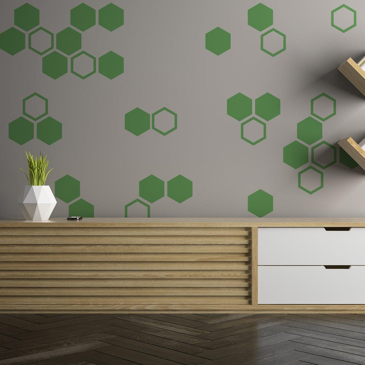 Honeycomb wall decals in green on a modern gray wall, featuring geometric hexagon designs for stylish home decor.