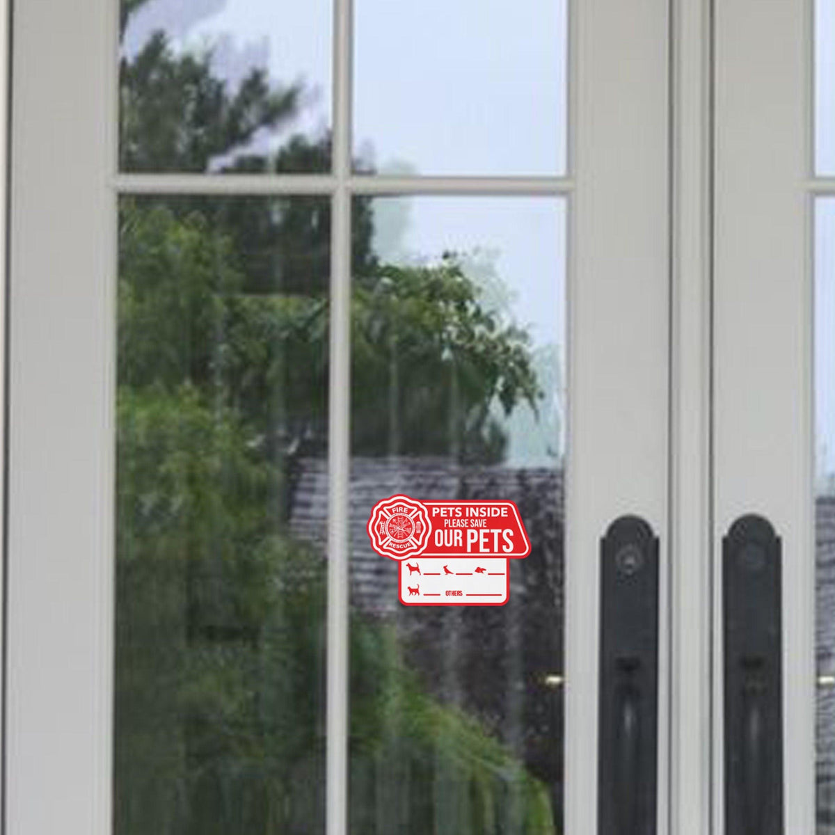 Emergency pet alert sticker displayed on a glass door, indicating pets are inside for safety.