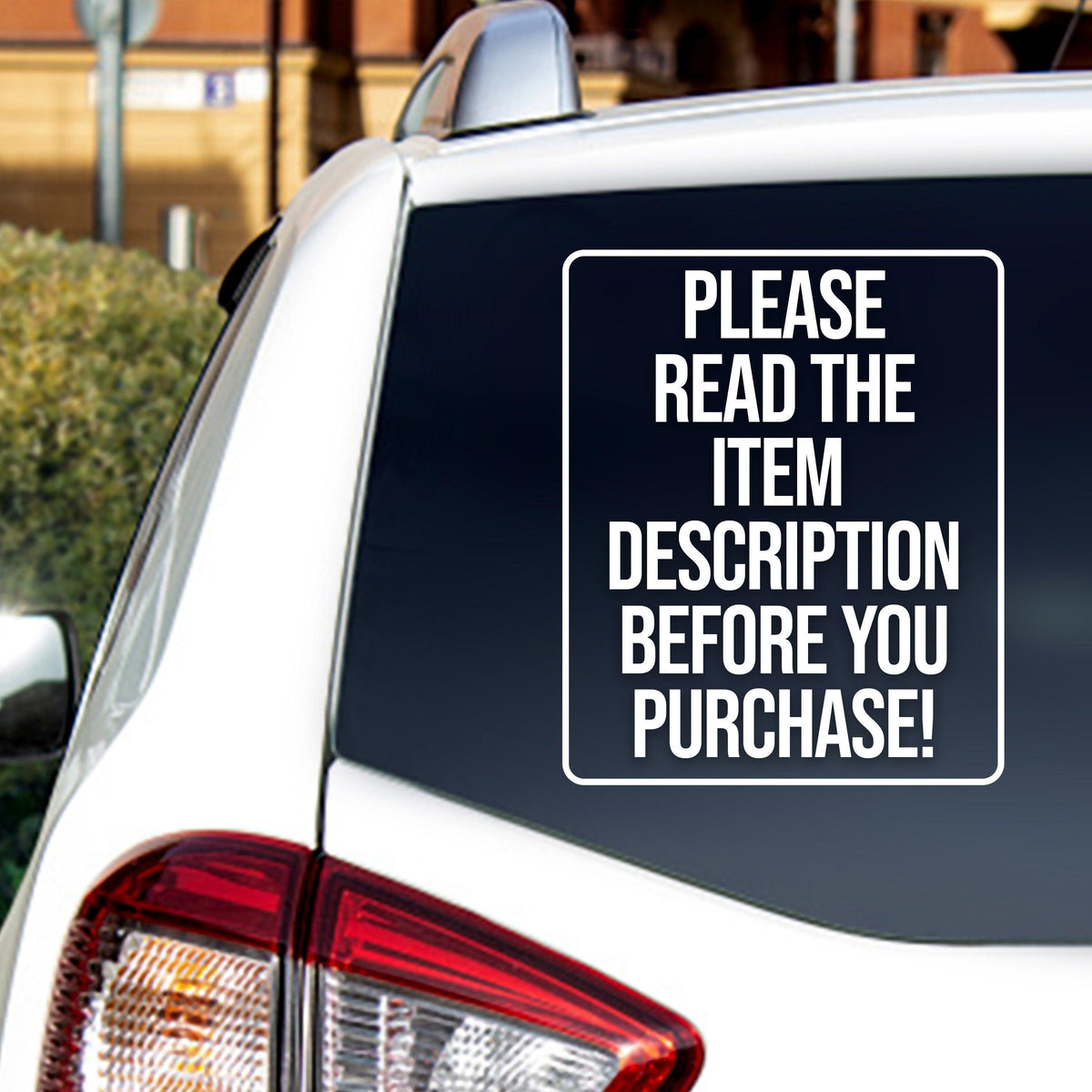 Vinyl car window decal with a message: 'Please read the item description before you purchase!' on SUV window.