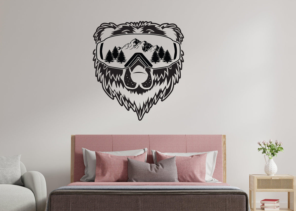 Vinyl wall decal of a bear wearing ski goggles with mountains.