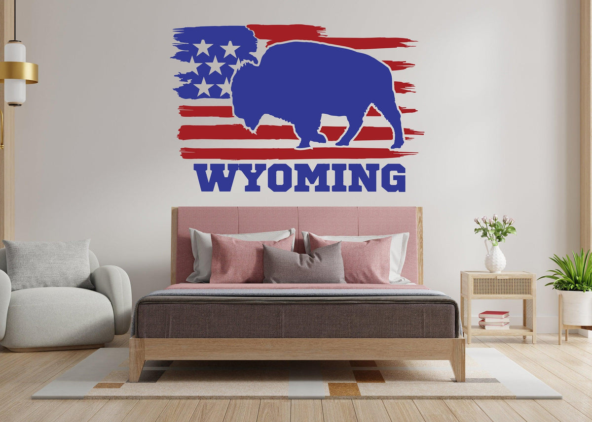 Wyoming state wall decal featuring bison silhouette and American flag design, enhancing rustic home decor.