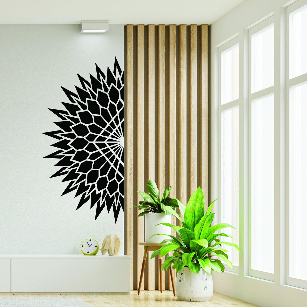 Half geometric mandala wall decal in modern living room with plant and natural light.