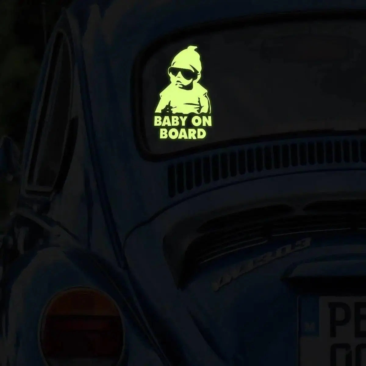 Glow-in-the-dark baby on board car decal for added vehicle safety and visibility.