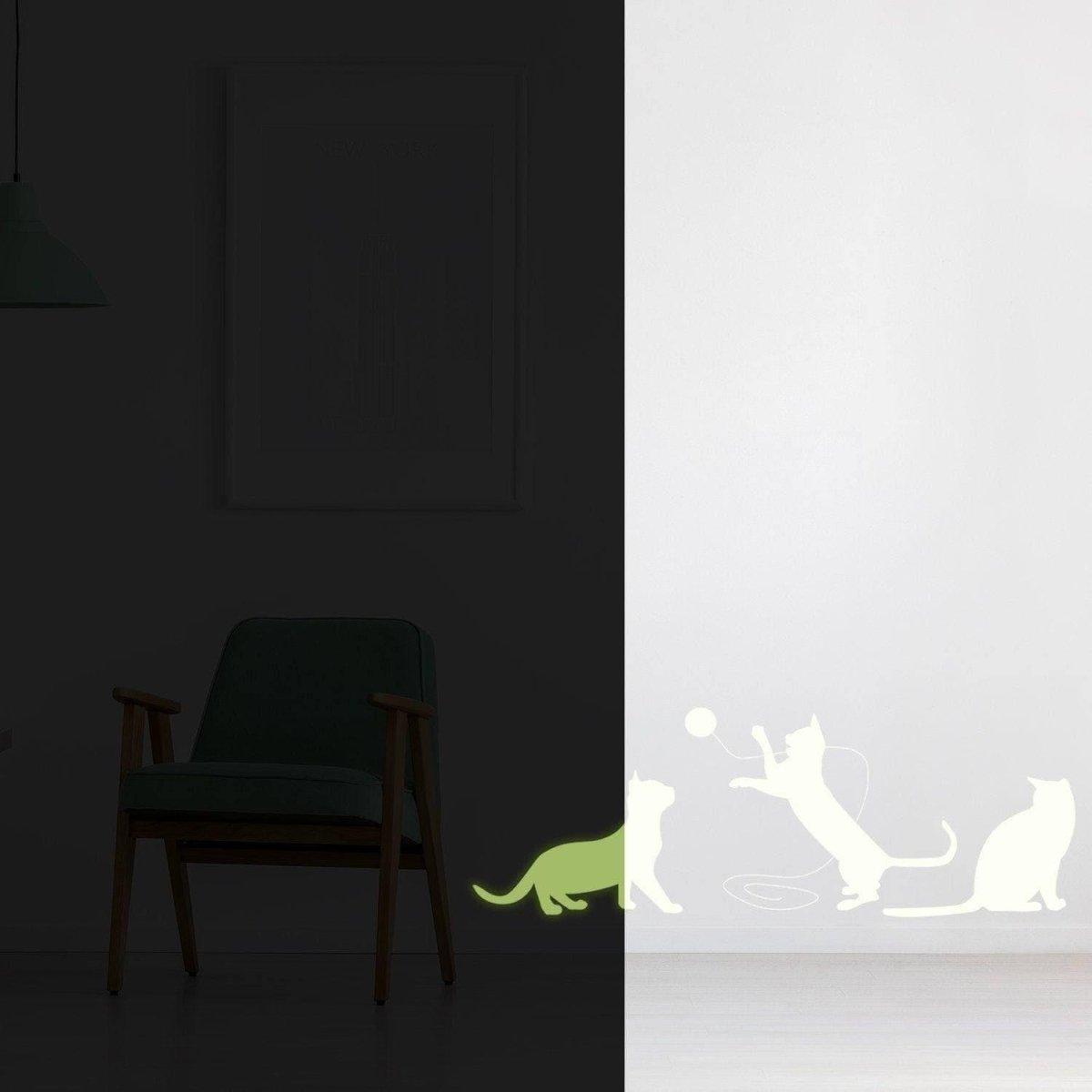 Glow in the dark big cat wall decal featuring playful kitten silhouettes on a modern wall.