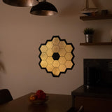 James Webb Space Telescope mirror wall sticker in gold chrome, adding a celestial touch to modern decor.