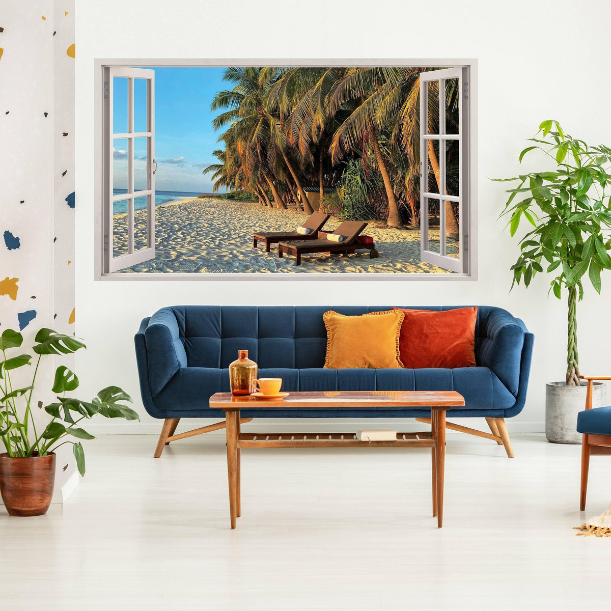 Tropical paradise window sticker featuring a beach view with palm trees and lounge chairs in a modern living room.