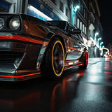 SleekLine™ Peel-and-Stick Geometric Car Decals on a stylish car, enhancing its modern look at night.