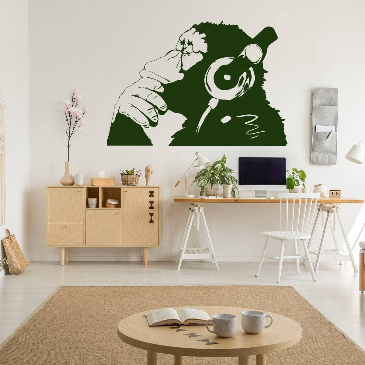 Contemplative primate wall art sticker in a stylish room.