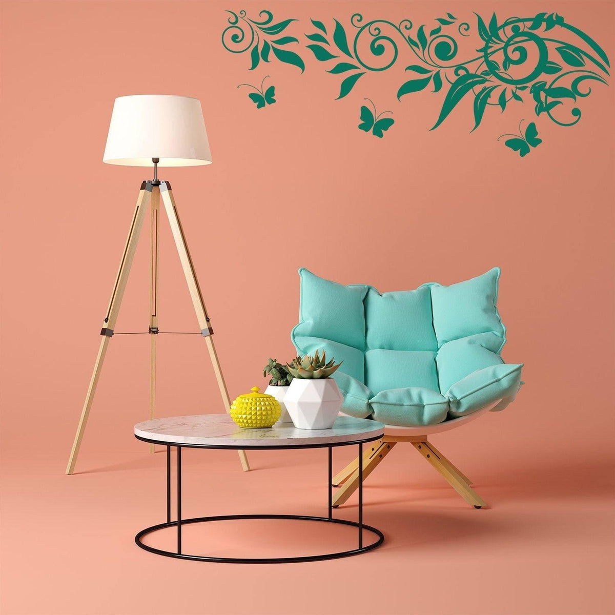 Vinyl Whimsy Wings sticker wall art above cozy chair and lamp in stylish kid's room decoration.