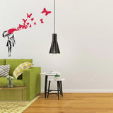 Emotional Butterfly Girl wall decal above a green couch, enhancing modern living space with street art vibes.