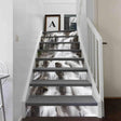 Staircase decorated with waterfall vinyl sticker decals enhancing home decor with artistic design.
