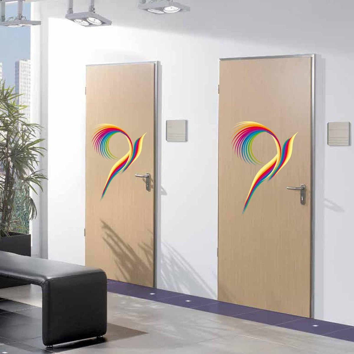 Two office doors featuring colorful vinyl logo decals for personalized branding.