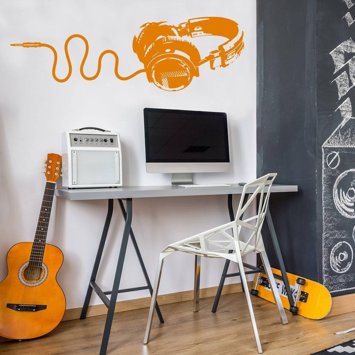 Decorative vinyl wall decal of headphones in orange.