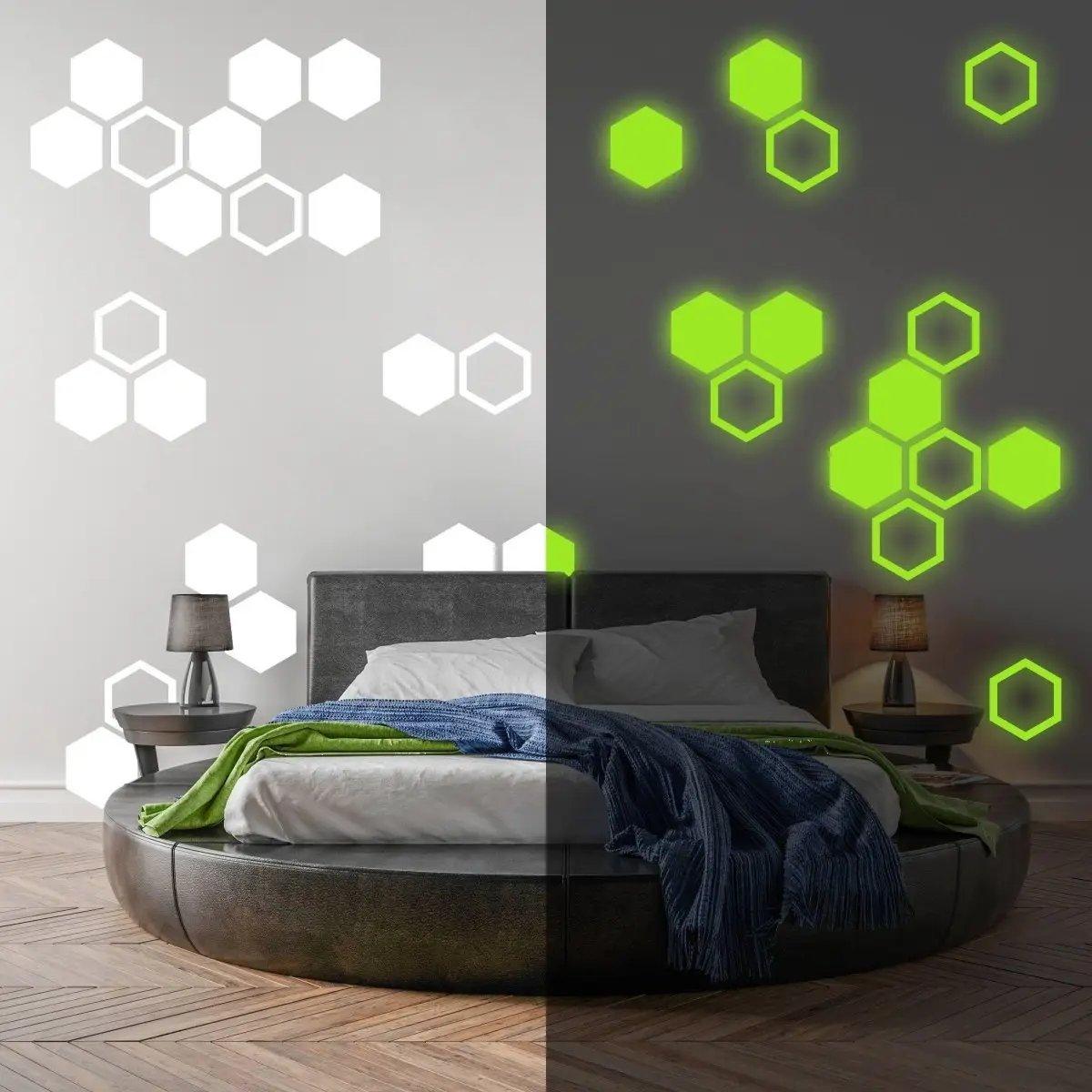 Glow in the dark hexagon wall stickers illuminating a child's bedroom, contrasting with white decals.