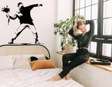 Flower Thrower Street Art Wall Decal featuring the flower throwing figure and bouquet composition shown in the product gallery