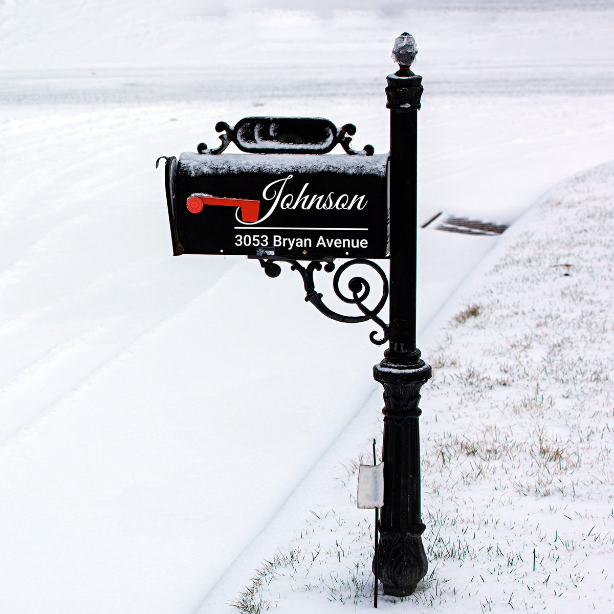 Custom mailbox address decal designed for visibility when light hits reflective vinyl