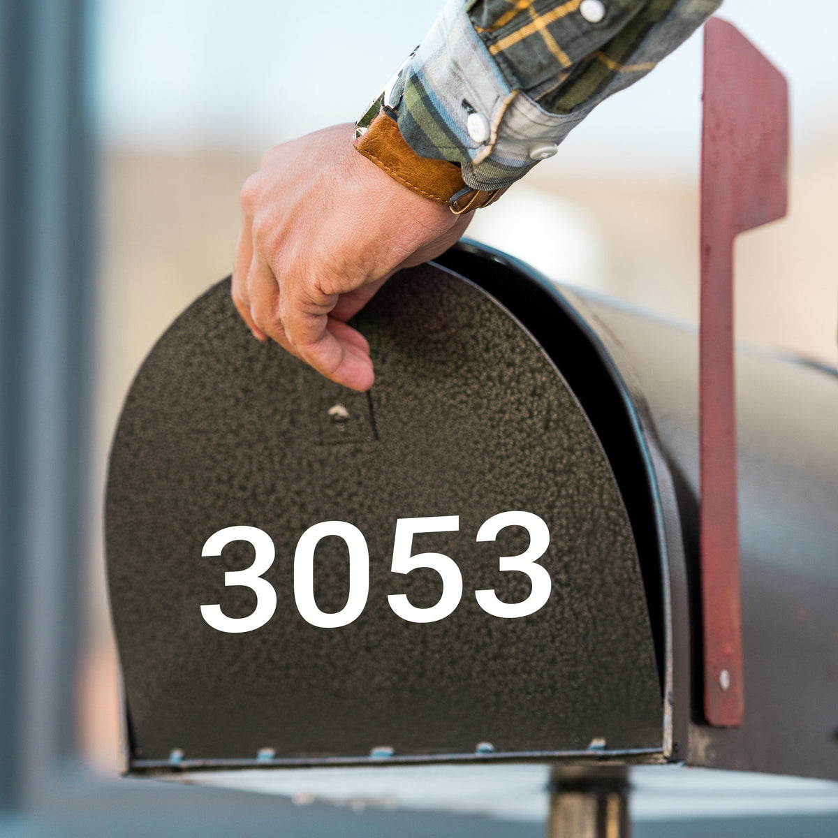 Reflective cut vinyl mailbox label showing customer selected name and address details