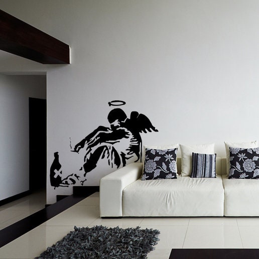 Fallen Angel Street Art Wall Decal featuring wings and halo