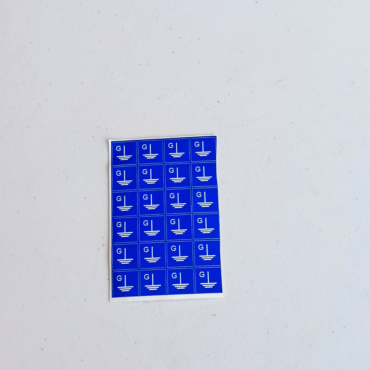 Additional product view of Blue Grounding Symbol Stickers.