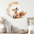 Watercolor baby fox sitting beneath a beige moon wall decal above a wooden child's bed in a nursery.