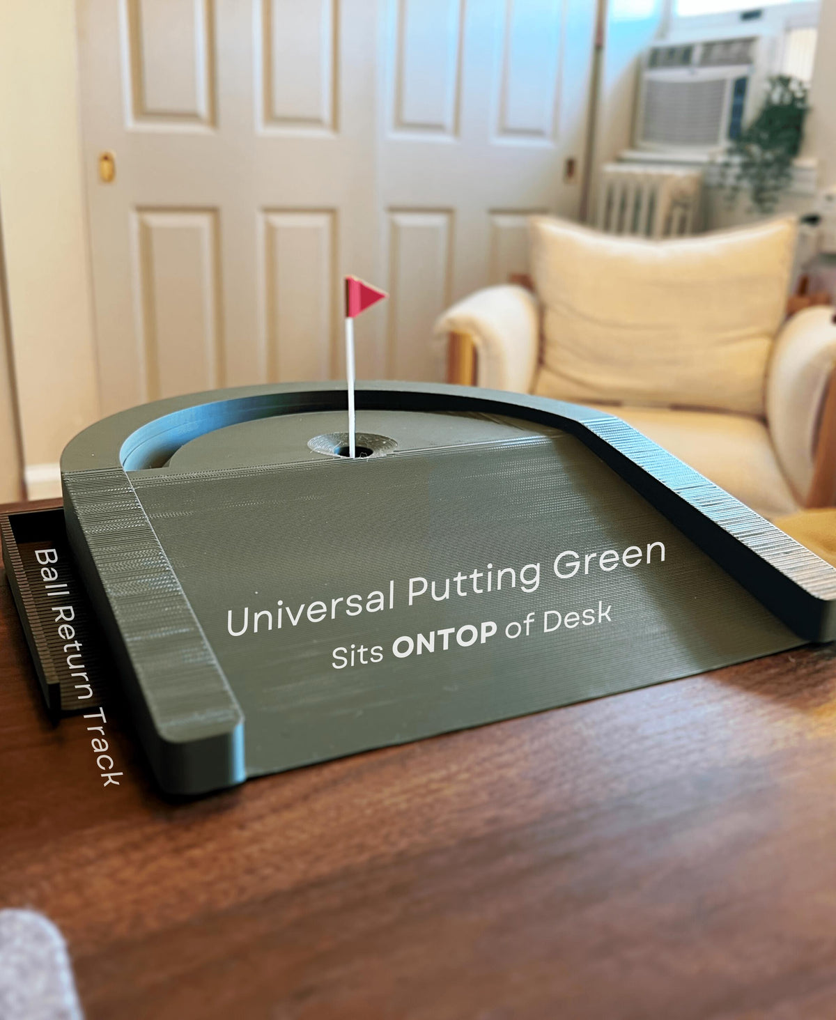 Universal putting green desktop golf game with ball return track.