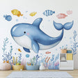 Whale Wall Decals for Kids featuring a large whale, smaller sea life elements, coral and bubbles