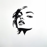 Stylized black female face wall decal, modern art wall sticker for elegant decor in bedrooms or salons.