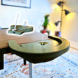 Desktop Golf Game on a table with a mini golf hole and flag.